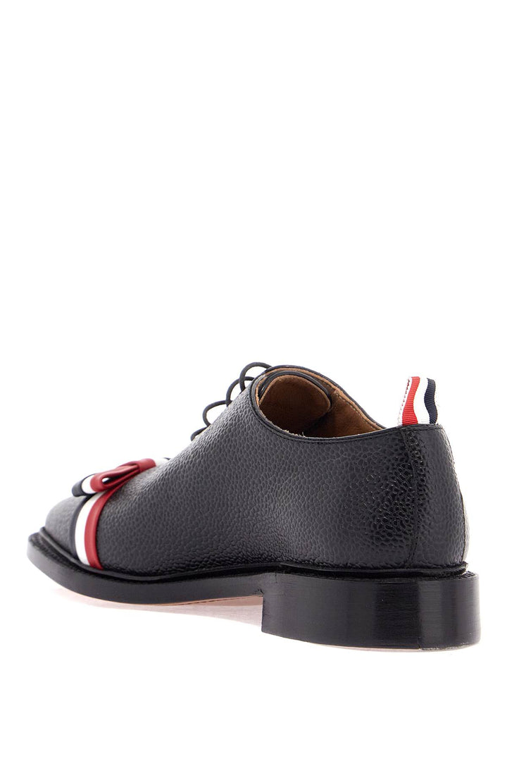 elegant wholecut shoes in black calfskin with rwb bow-2