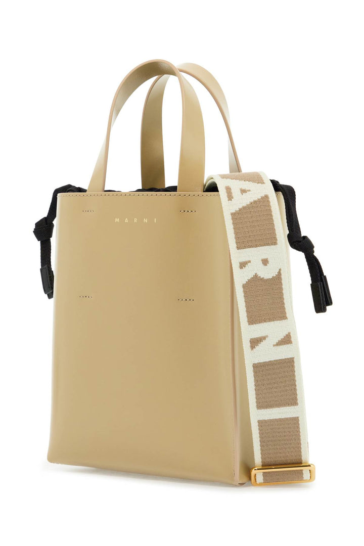 beige leather shopping bag with short handles and shoulder strap-2