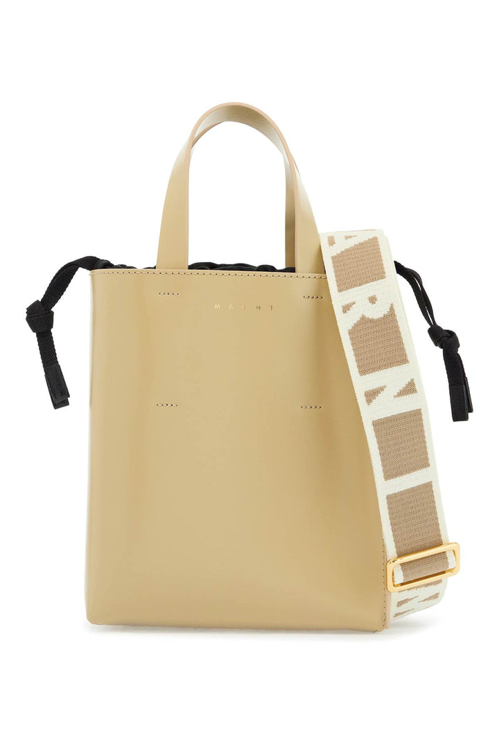 beige leather shopping bag with short handles and shoulder strap-0